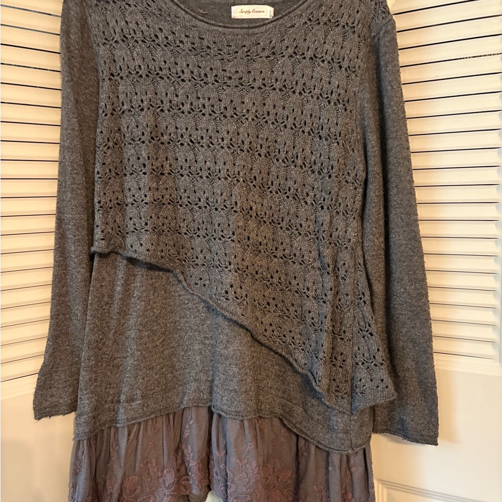 Very pretty three layer knit sweater with lace at the bottom. Size small. Unique